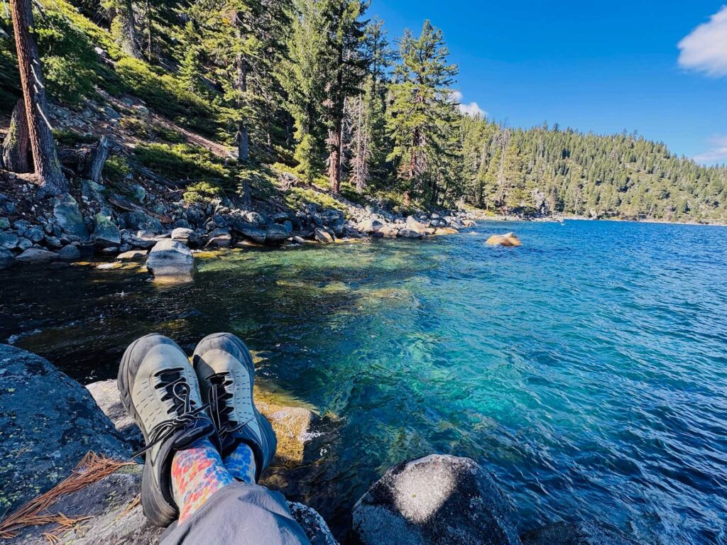 a POV photo of relaxing at a peaceful lake